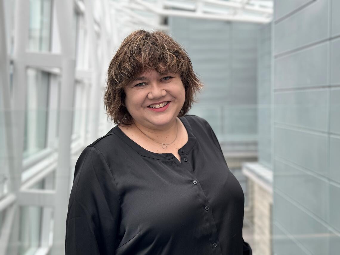 A person smiling for the camera