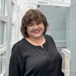 A person smiling for the camera