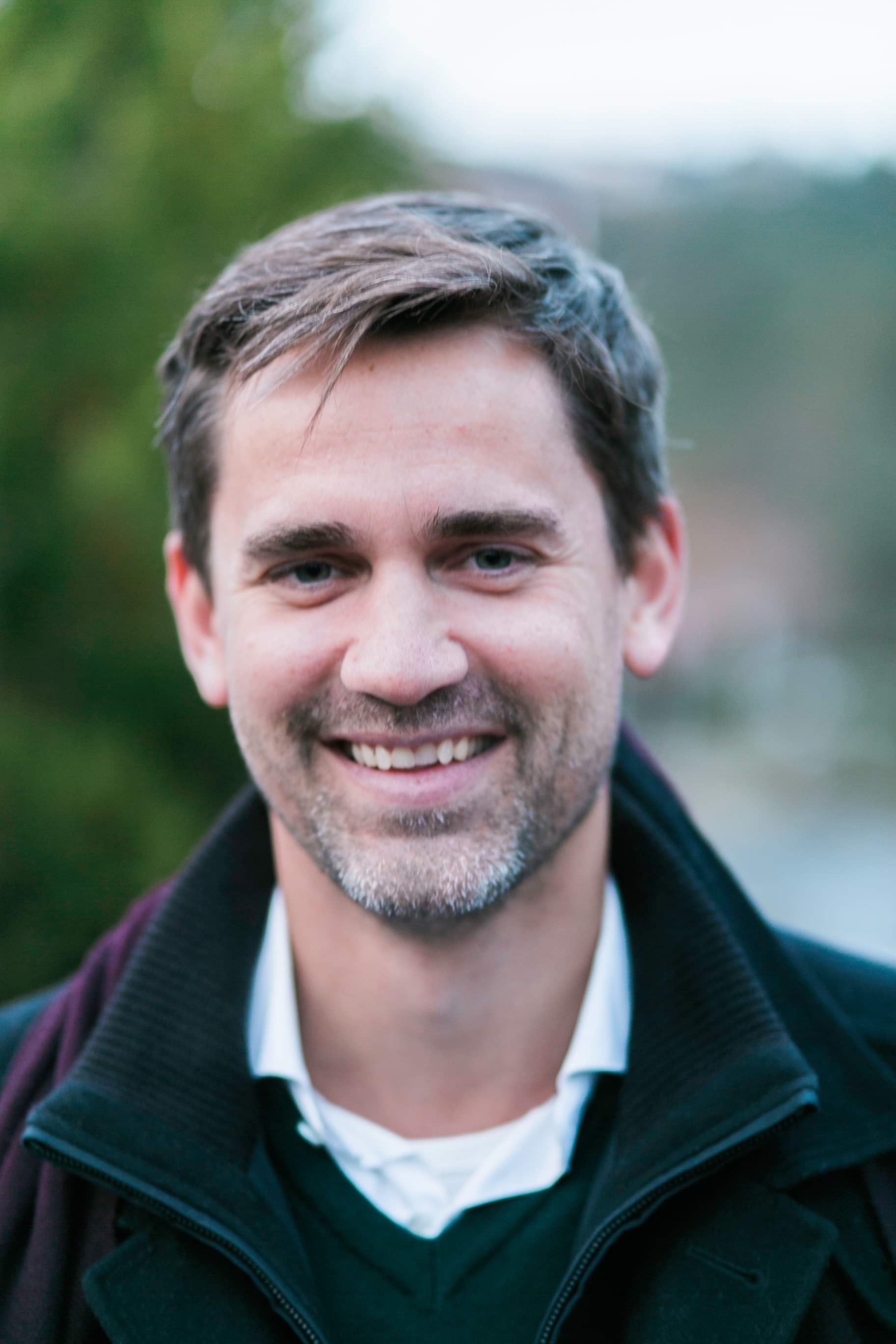 A man smiling for the camera