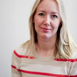 A woman in a striped shirt