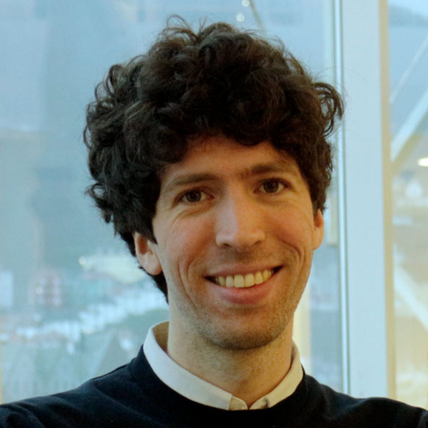 A man with curly hair