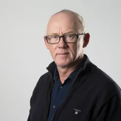 A man wearing glasses