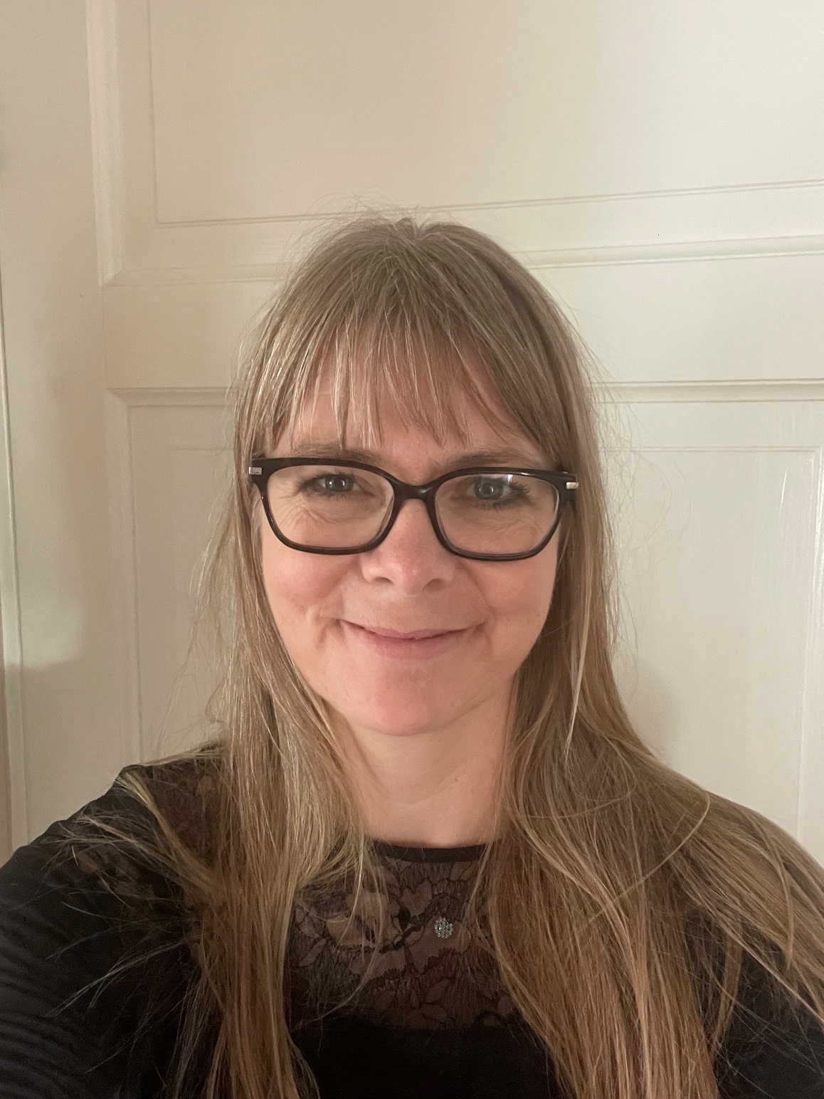 A woman wearing glasses