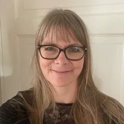 A woman wearing glasses