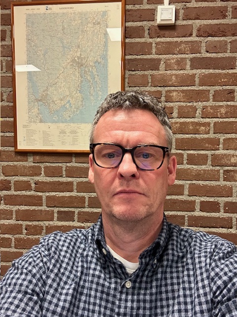 A man wearing glasses