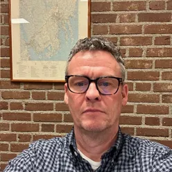 A man wearing glasses