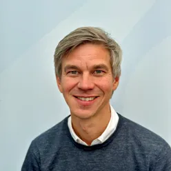 A man smiling for the camera