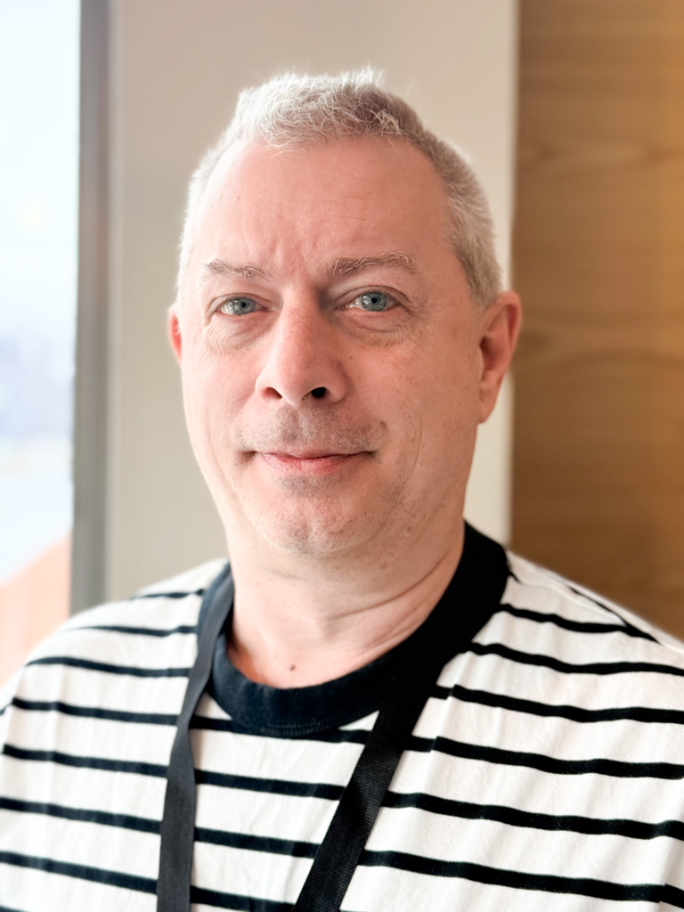 A man wearing a striped shirt