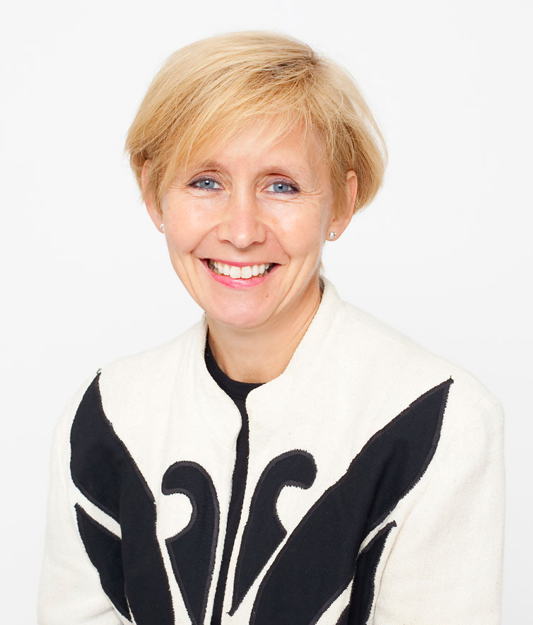 En person som smiler for kameraet