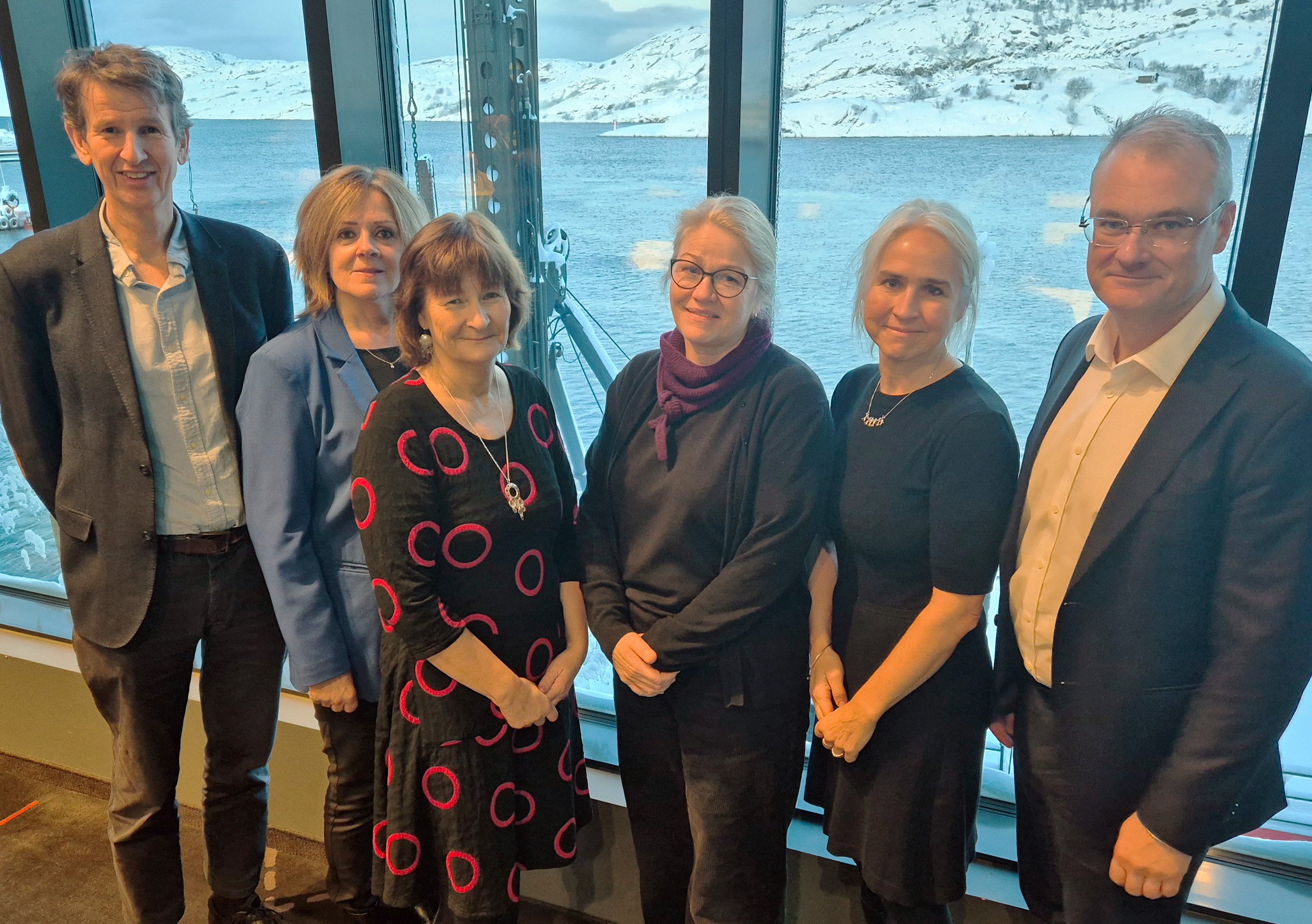 A group of people posing for a photo